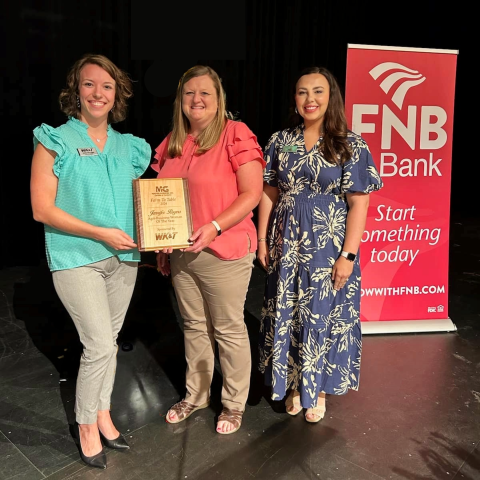 Jennifer Rogers received the Agri-Business Woman of the Year Award from representatives from the Mayfield Graves County Chamber of Commerce at their annual event, Farm to Table Dinner, August 2024. 